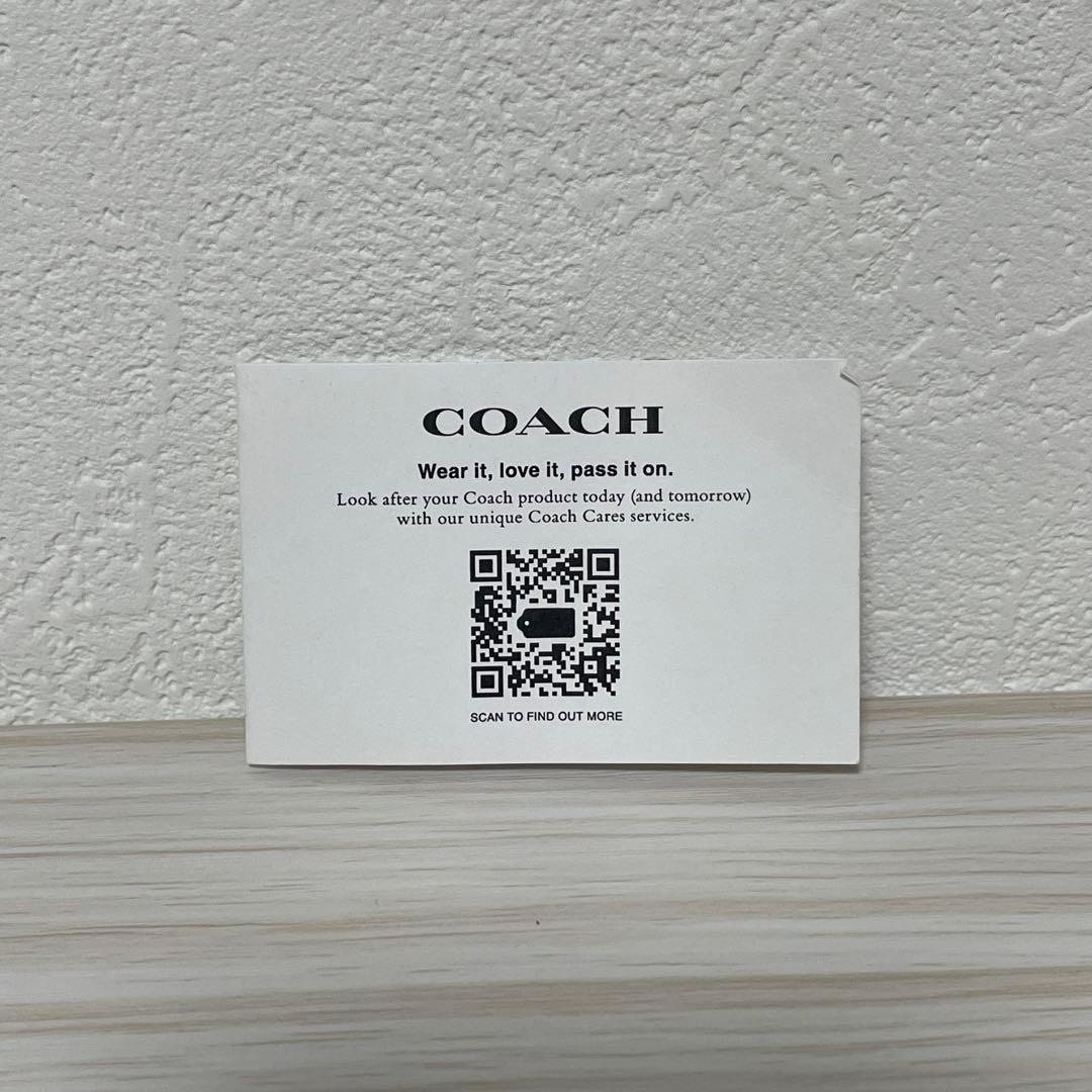 訳あり新品 COACH 二つ折り財布 ロゴチャーム付きファスナー