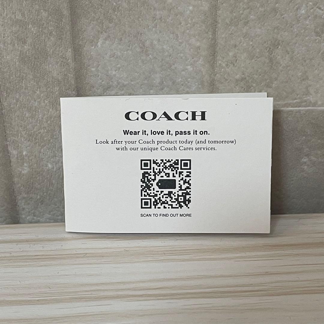 訳あり新品 COACH 二つ折り財布 シグネチャー柄 ホワイト