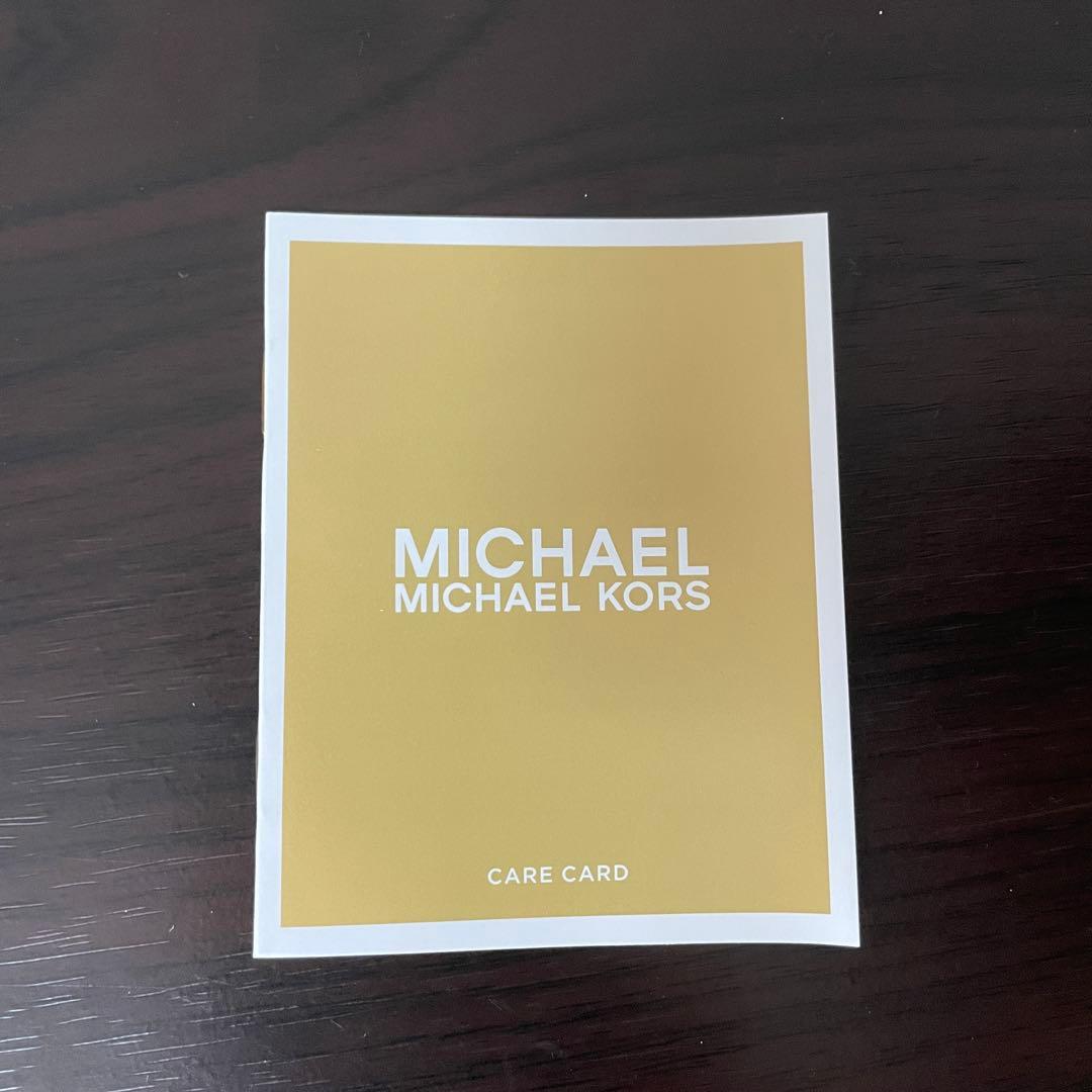 訳あり新品 MICHAEL KORS 三つ折り財布 シグネチャー柄