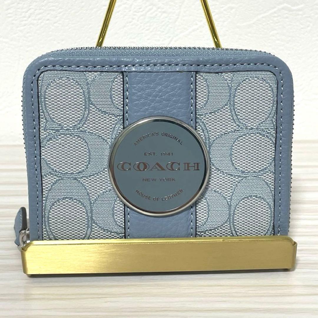 訳あり新品 COACH 二つ折り財布 ライトブルー シグネチャー