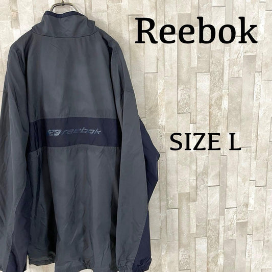 古着 Reebok ナイロンジャケット バックプリント サイズL バイカラー