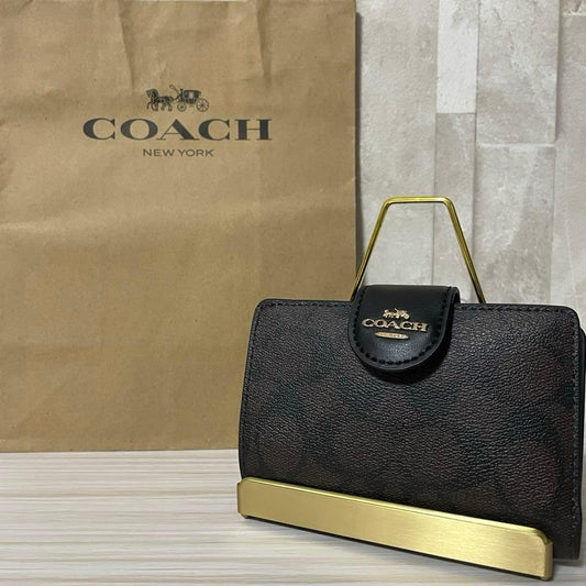 訳あり新品 COACH 二つ折り財布 シグネチャー柄 茶×黒