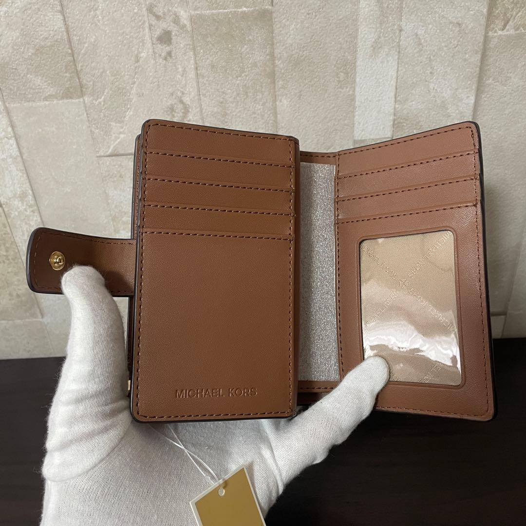 訳あり新品 MICHAEL KORS 二つ折り財布 シグネチャー柄