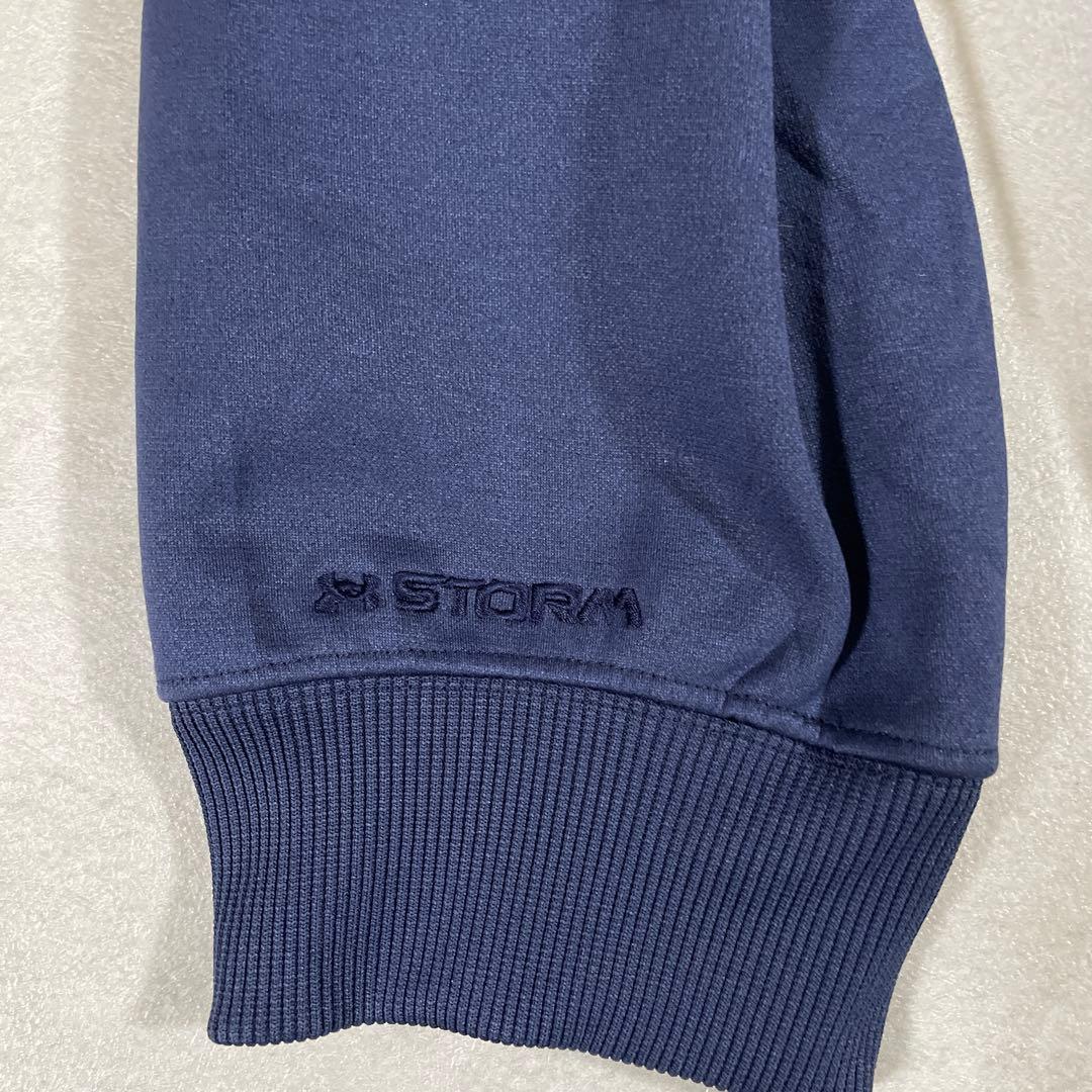 古着 UNDER ARMOUR プルオーバーパーカー プリント STORM 紺色