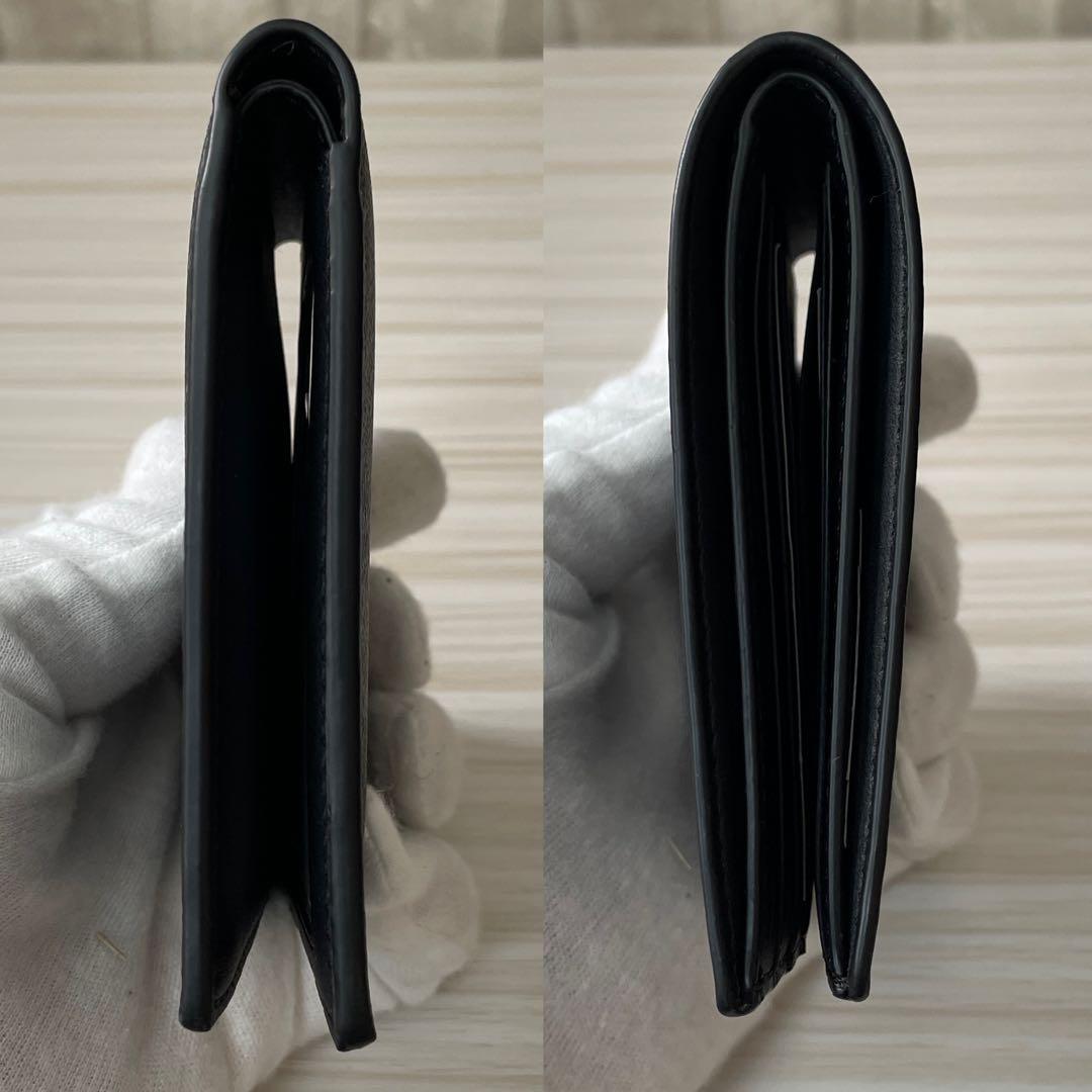 訳あり新品 COACH 二つ折り財布 シグネチャー柄 ブラック