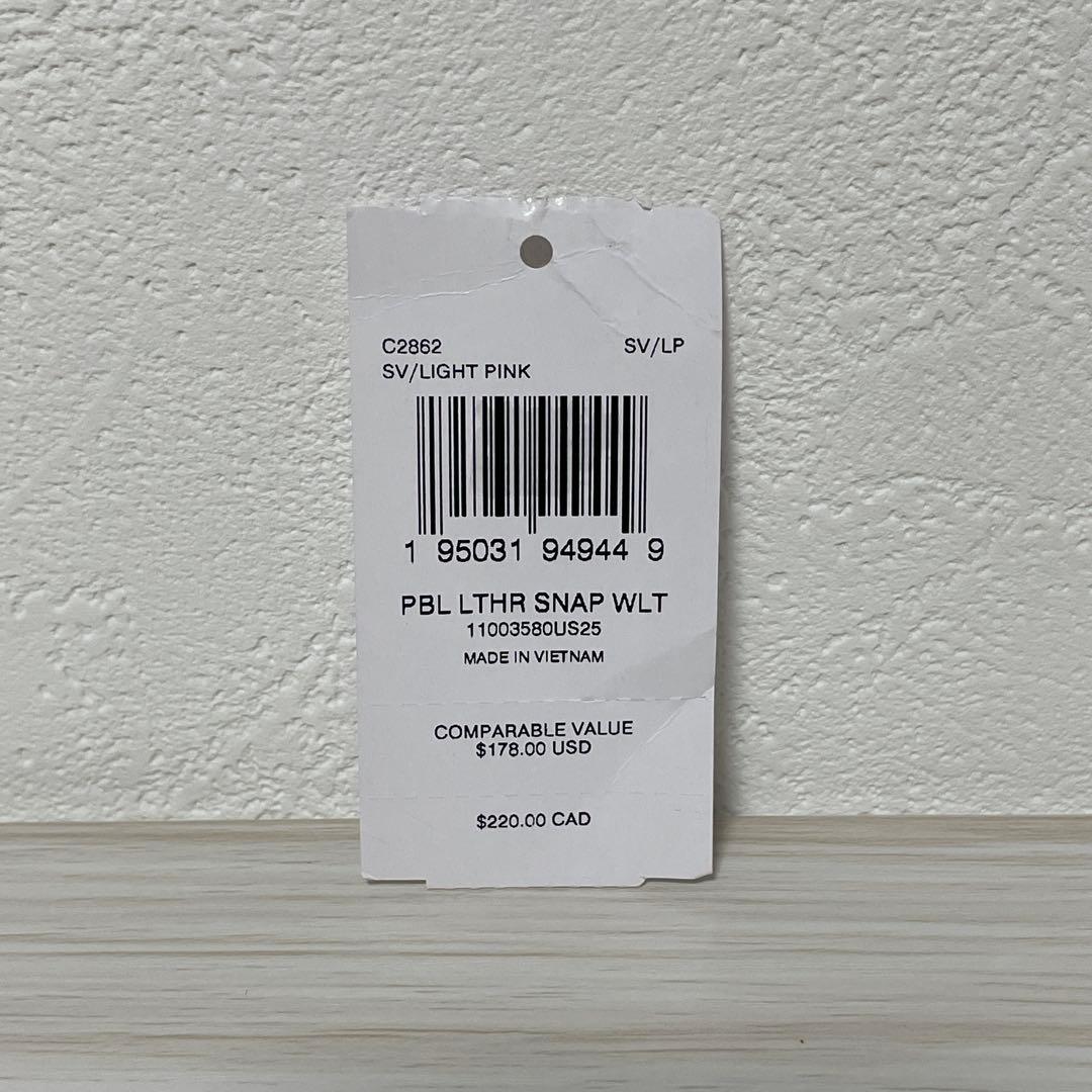 訳あり新品 COACH 二つ折り財布 ロゴチャーム付きファスナー