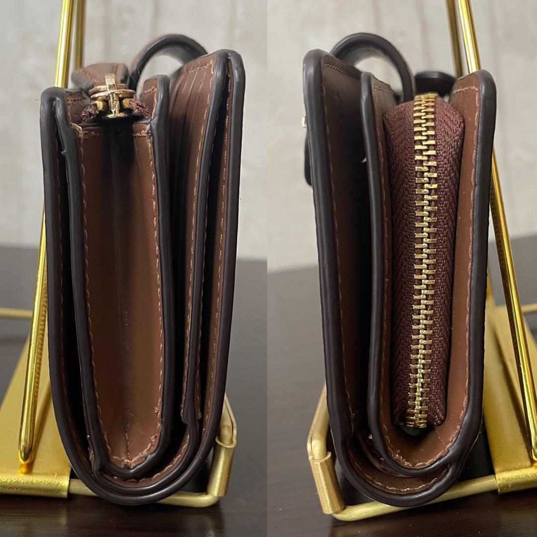 訳あり新品 COACH 二つ折り財布 シグネチャー総柄 ブラウン