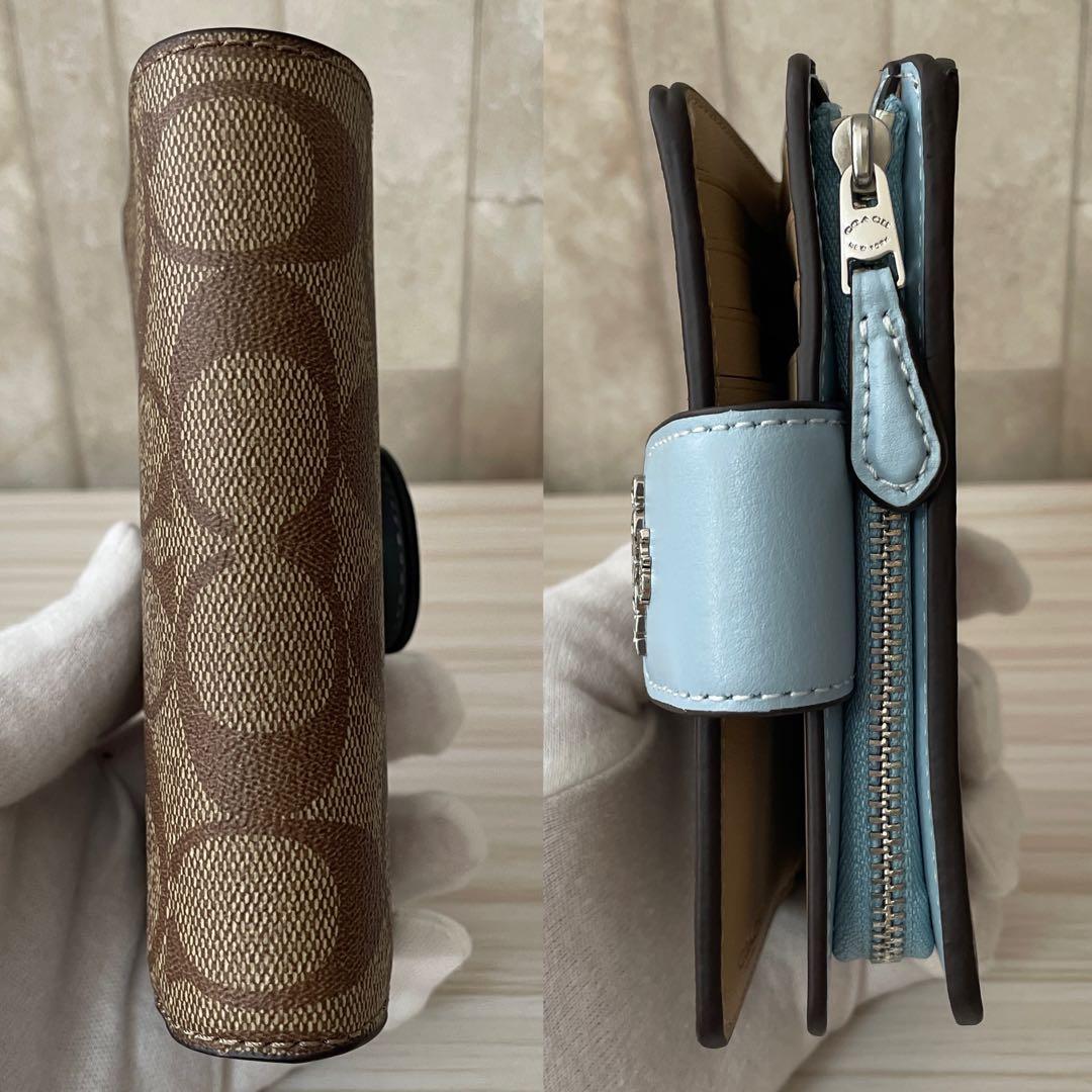 訳あり新品 COACH 二つ折り財布 シグネチャー総柄 茶色×水色