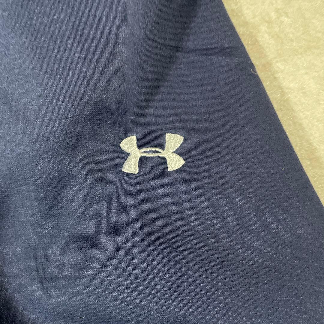 古着 UNDER ARMOUR プルオーバーパーカー プリント STORM 紺色