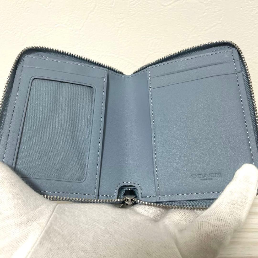 訳あり新品 COACH 二つ折り財布 ライトブルー シグネチャー