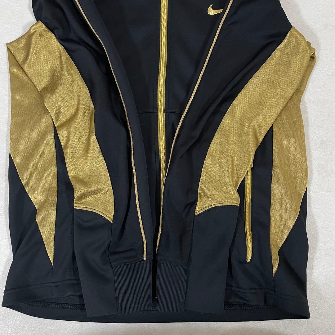 古着NIKE トラックジャケット サイズM ブラック ゴールド ツートン