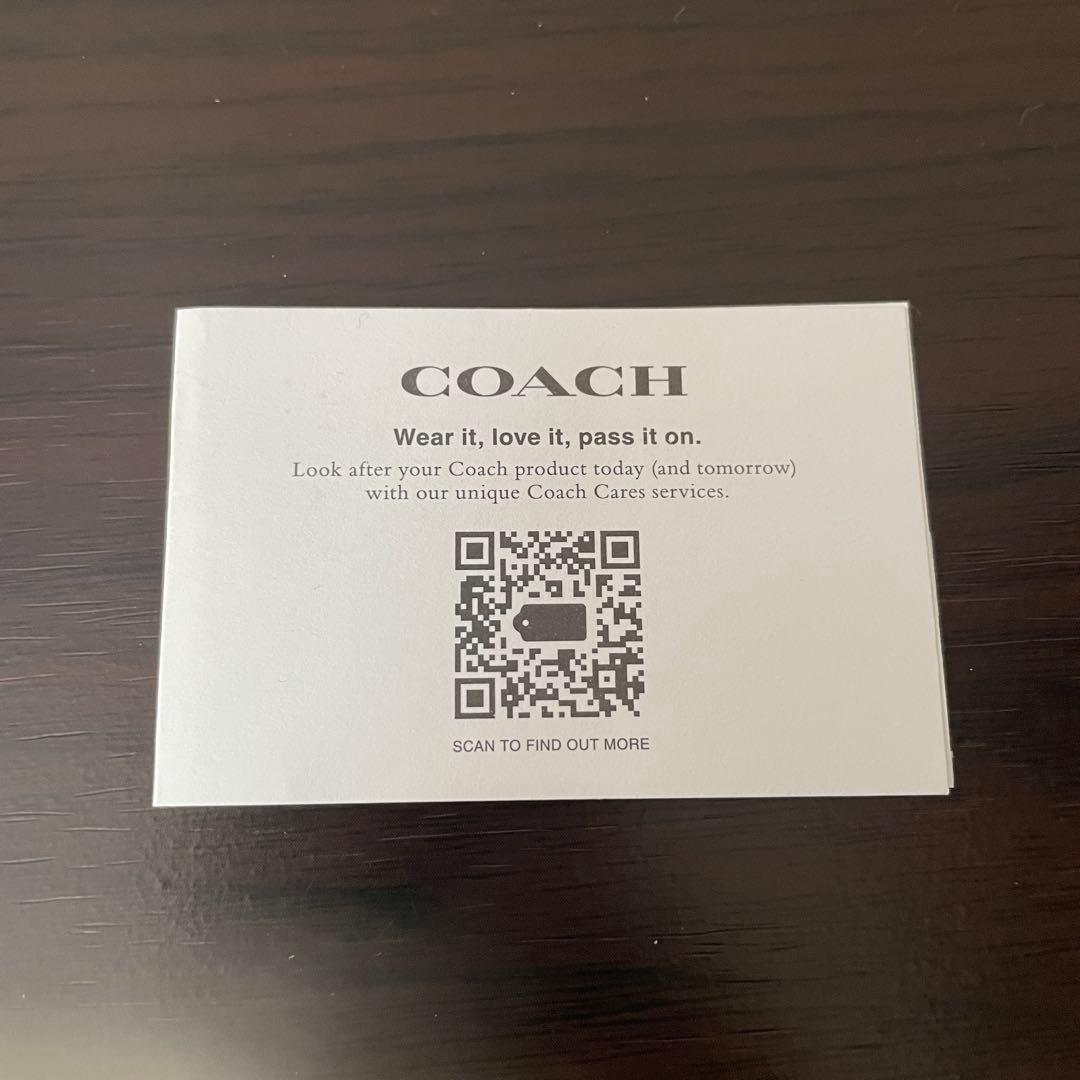 訳あり新品 COACH 二つ折り財布 シグネチャー総柄 ブラウン