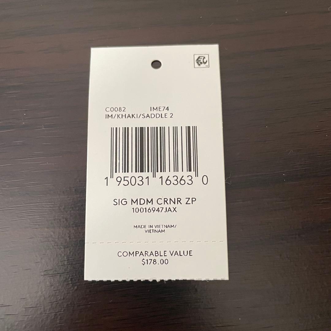 訳あり新品 COACH 二つ折り財布 シグネチャー総柄 ブラウン