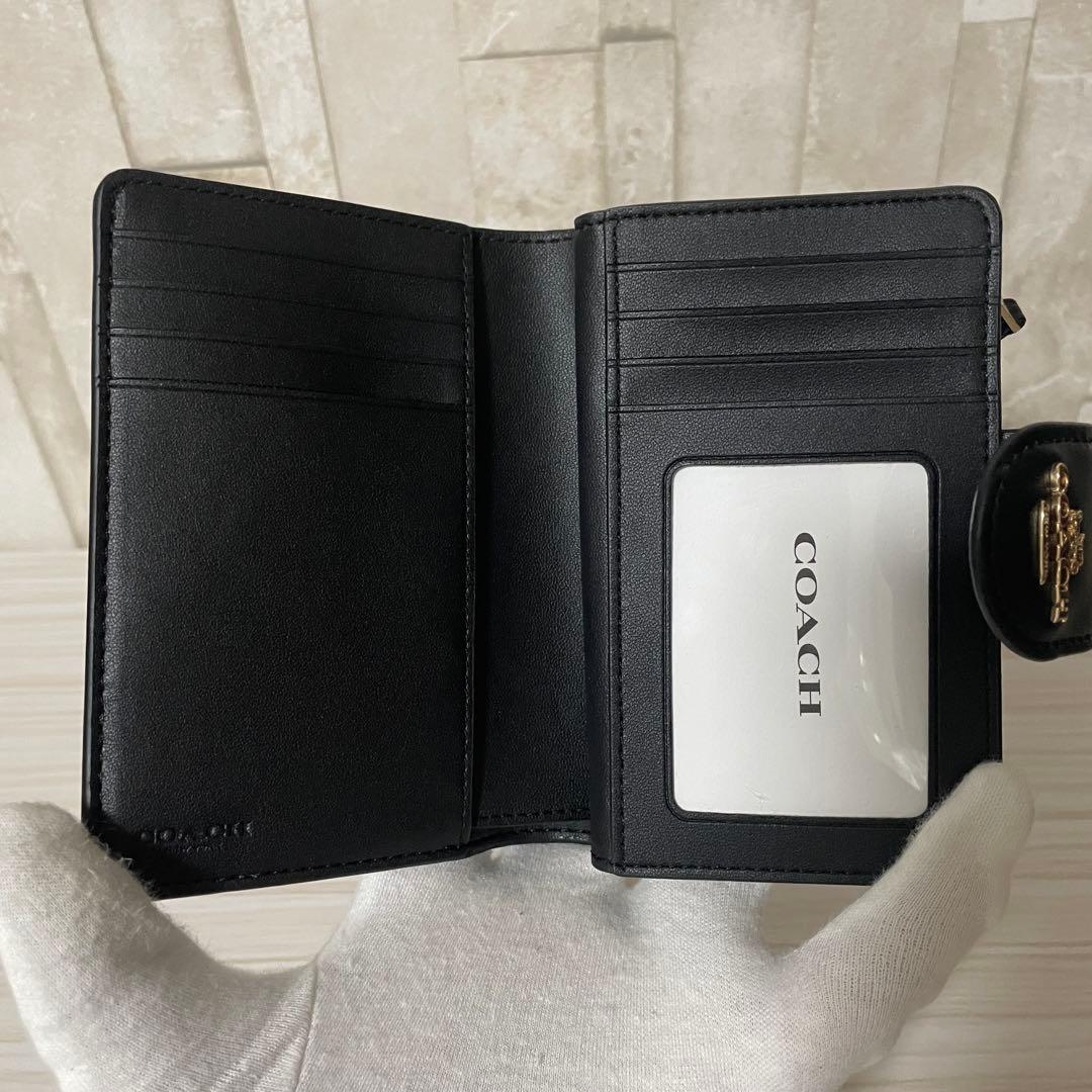 訳あり新品 COACH 二つ折り財布 シグネチャー柄 茶×黒