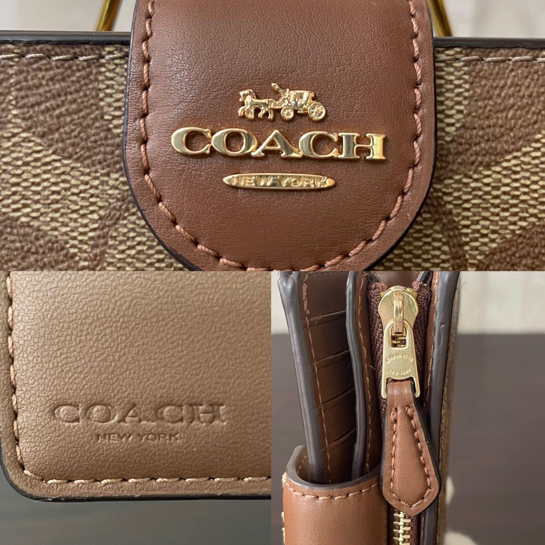 訳あり新品 COACH 二つ折り財布 シグネチャー総柄 ブラウン