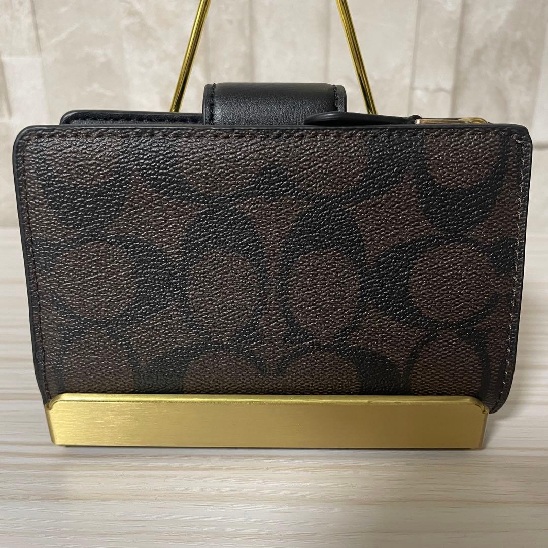 訳あり新品 COACH 二つ折り財布 シグネチャー柄 茶×黒