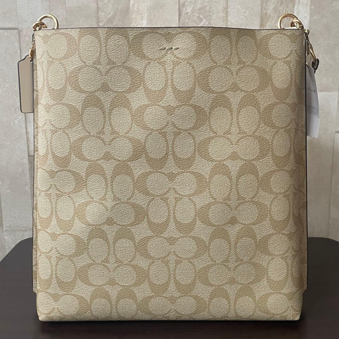 訳あり新品タグ付 COACH モリー バケットバッグ シグネチャー柄