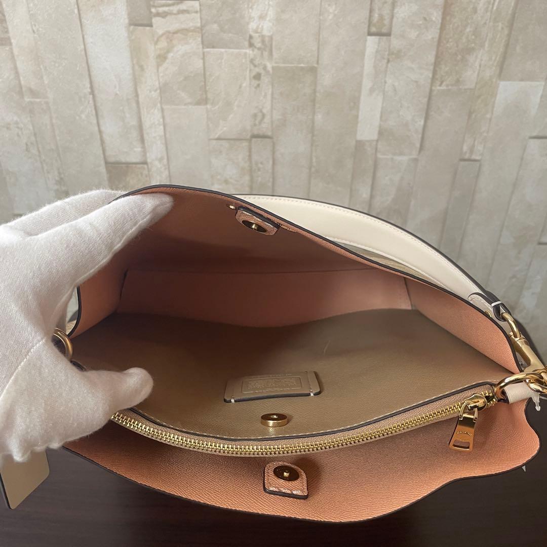 訳あり新品タグ付 COACH モリー バケットバッグ シグネチャー柄