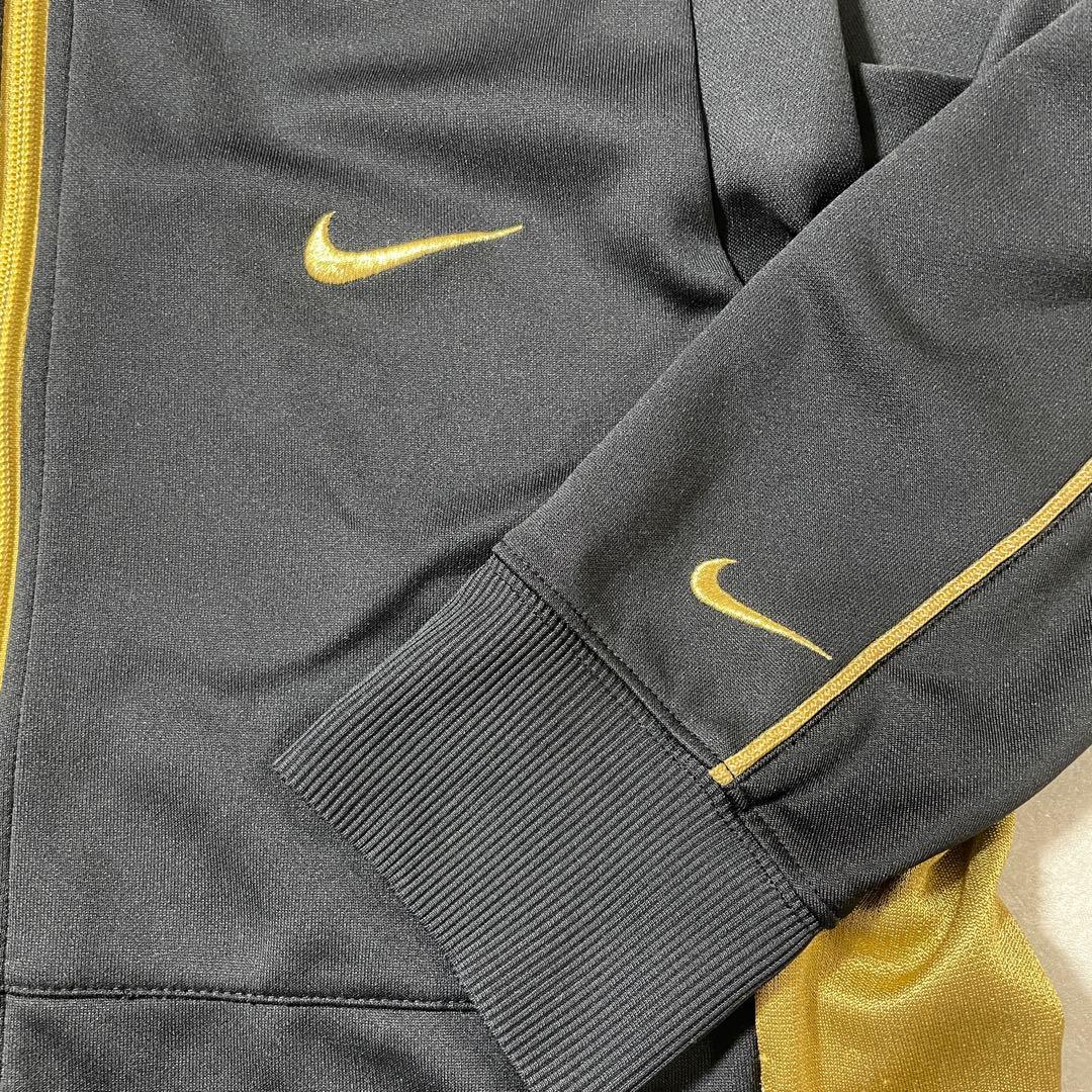 古着NIKE トラックジャケット サイズM ブラック ゴールド ツートン