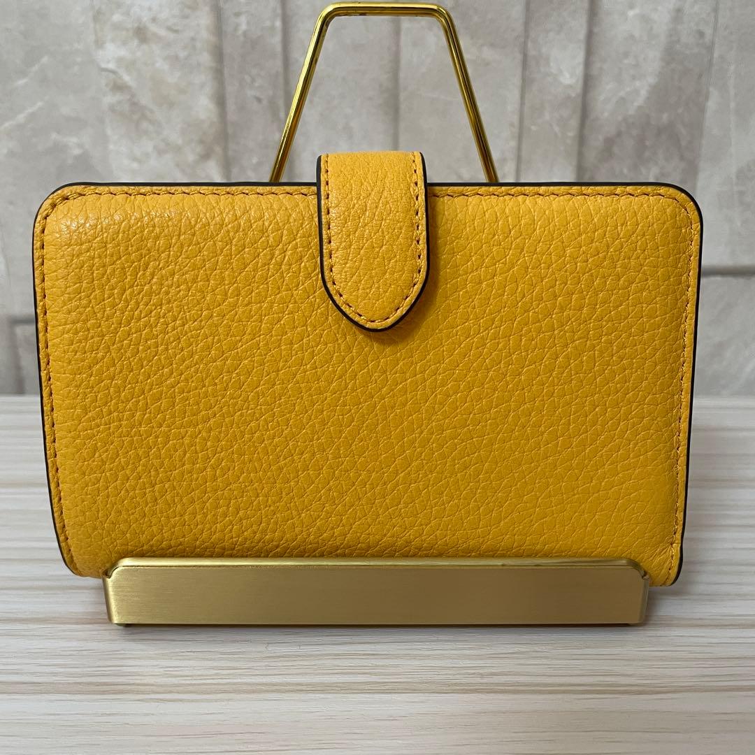訳あり新品 kate spade 二つ折り財布 イエロー