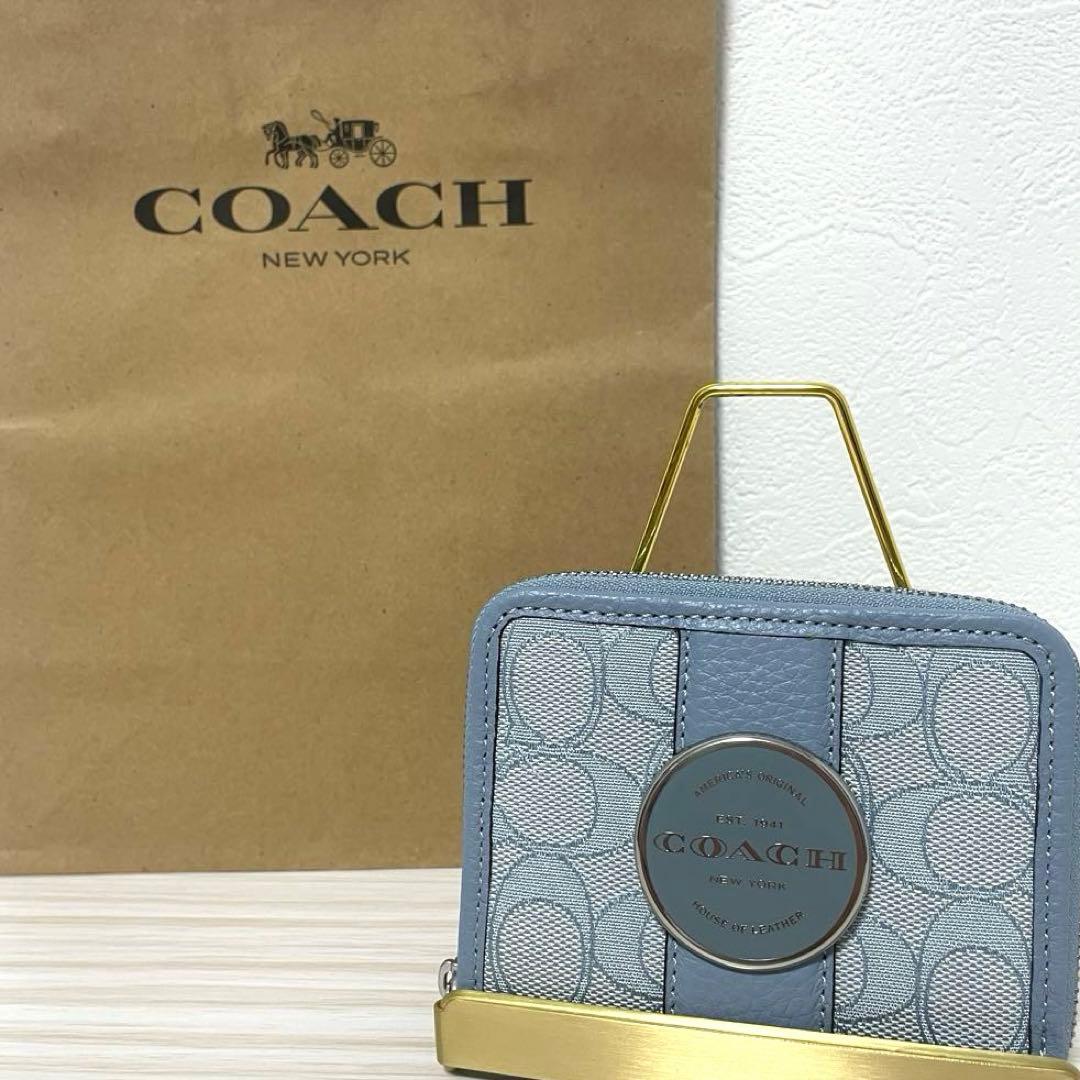 訳あり新品 COACH 二つ折り財布 ライトブルー シグネチャー