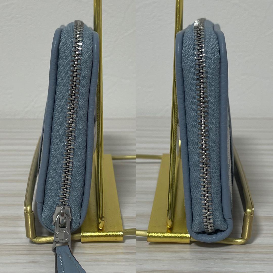 訳あり新品 COACH 二つ折り財布 ライトブルー シグネチャー