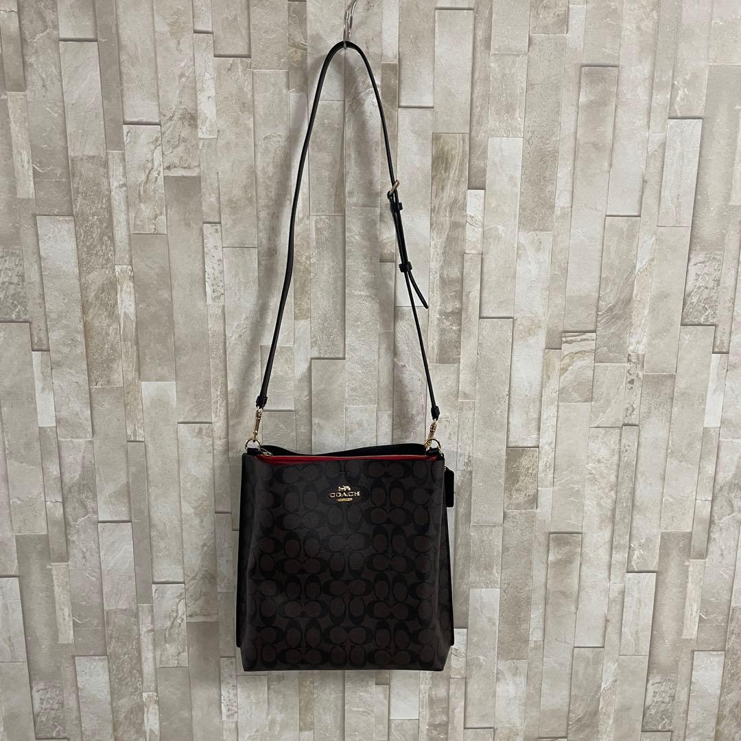 訳あり新品 COACH モリー バケットバッグ シグネチャー