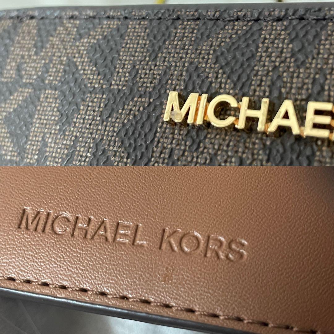 訳あり新品 MICHAEL KORS 二つ折り財布 シグネチャー柄