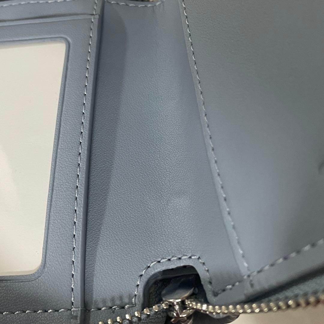 訳あり新品 COACH 二つ折り財布 ライトブルー シグネチャー