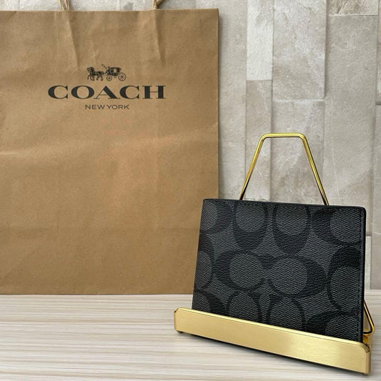 訳あり新品 COACH 二つ折り財布 シグネチャー柄 ブラック